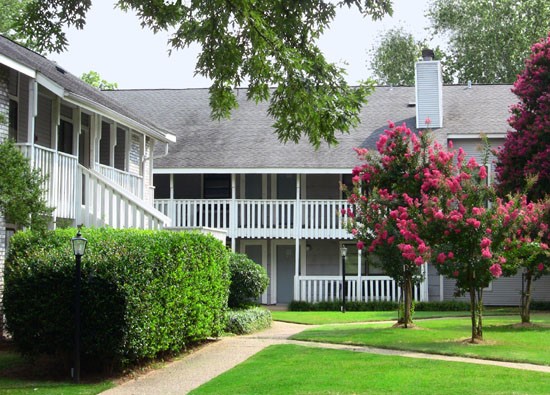 Pier Landing Apartments backside view of front office building with huge balcony
