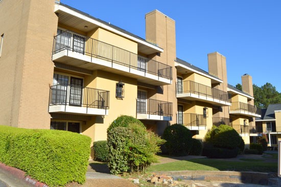 Chimney hill Exterior of Backside of Apartment Buildings With Balconies