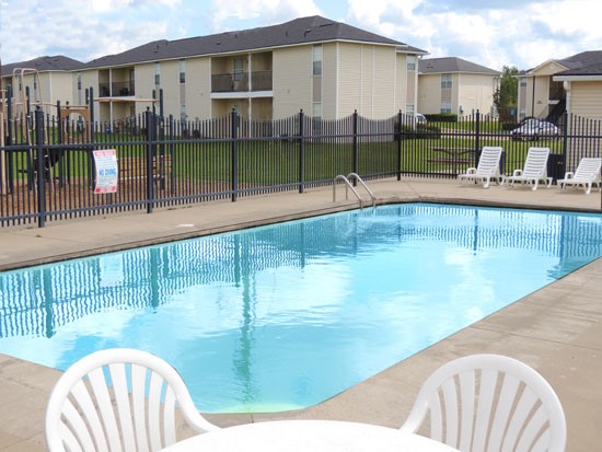 Fox Creek full view of rectangle shaped pool with tables and chairs