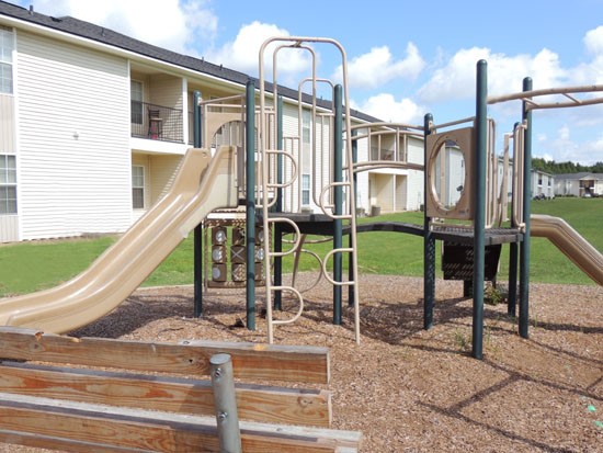 Fox Creek playground with lots of room and a bench