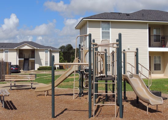 Fox Creek Apartments big playground with multiple benches to sit and relax