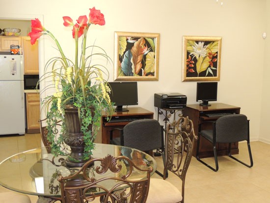 King Oaks Apartments business center with work station area, and kitchen