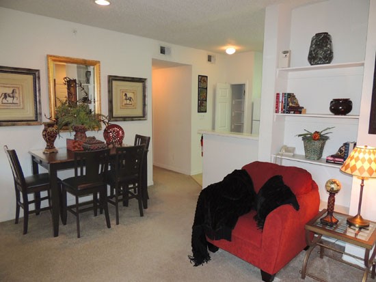 La Crosse model of living room looking into dining room and to hallway