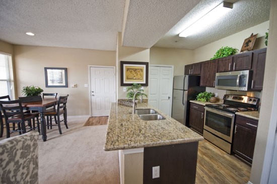 La Crosse open model kitchen looking into dining room