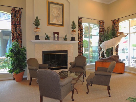 La Crosse interior of clubhouse, living area with chairs and cool art