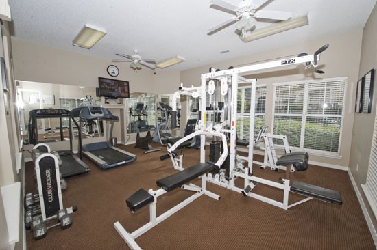 La Crosse fitness center with lots of workout equipment and tv