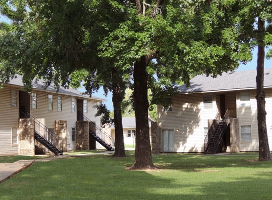 La Crosse Apartments beautiful green courtyard with trees for shade