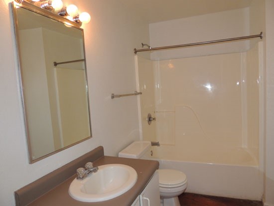 Lee Hardware model of white bathroom, inside apartments