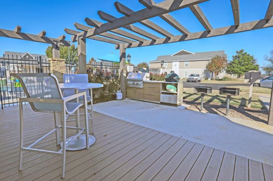 Reserve of Bossier Apartments pool BBQ Grills