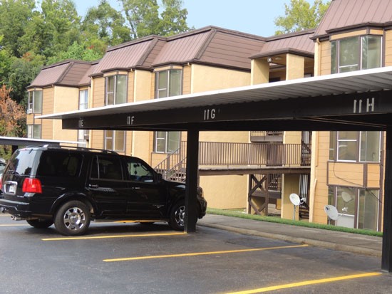 Riverbend Apartment overhead parking spots in front of apartment buildings