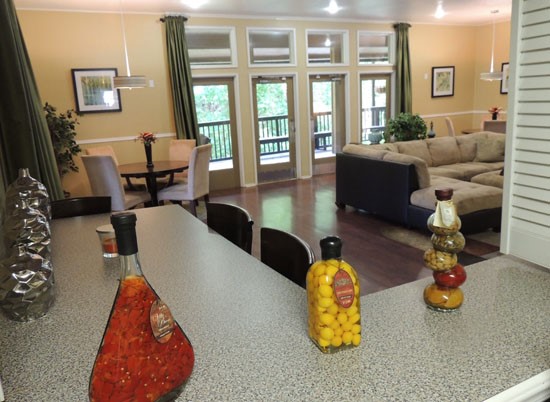 Riverbend Apartments bar area looking in residence living room area in  shreveport