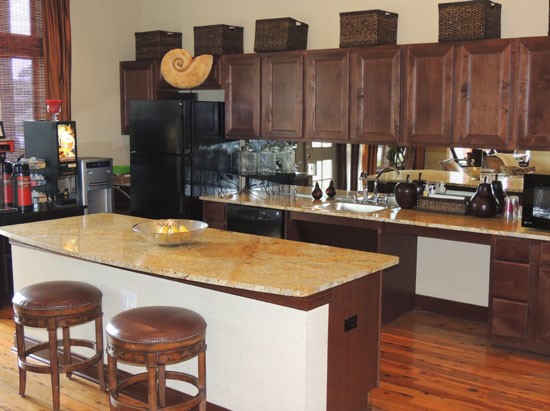 Springridge interior look at big open beautiful kitchen in clubhouse with an island
