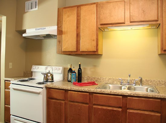 Woodland Terrance Apartments wood cabinets in model kitchen in Shreveport Kitchen