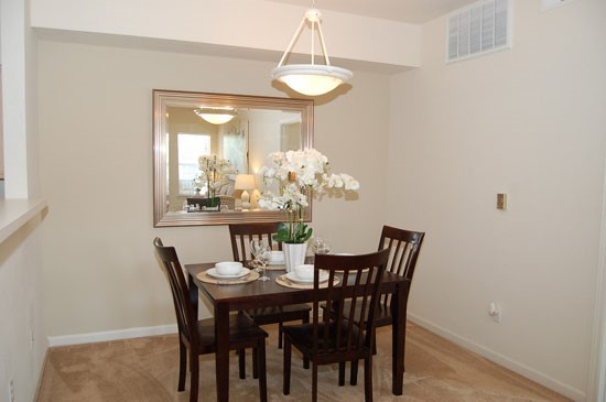 Westlake big open model dining room area with beautiful chandelier